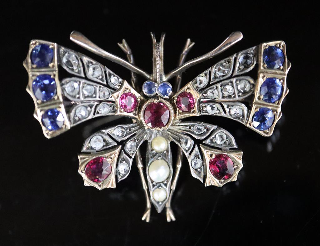 A Victorian, gold and silver, ruby, sapphire, split pearl and rose cut diamond set butterfly pendant brooch,